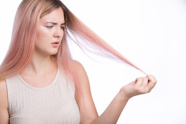 What is the best way to condition damaged colored hair?