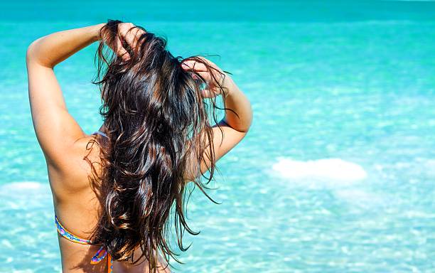 Chlorine vs. Saltwater: How to Protect Your Hair from Both