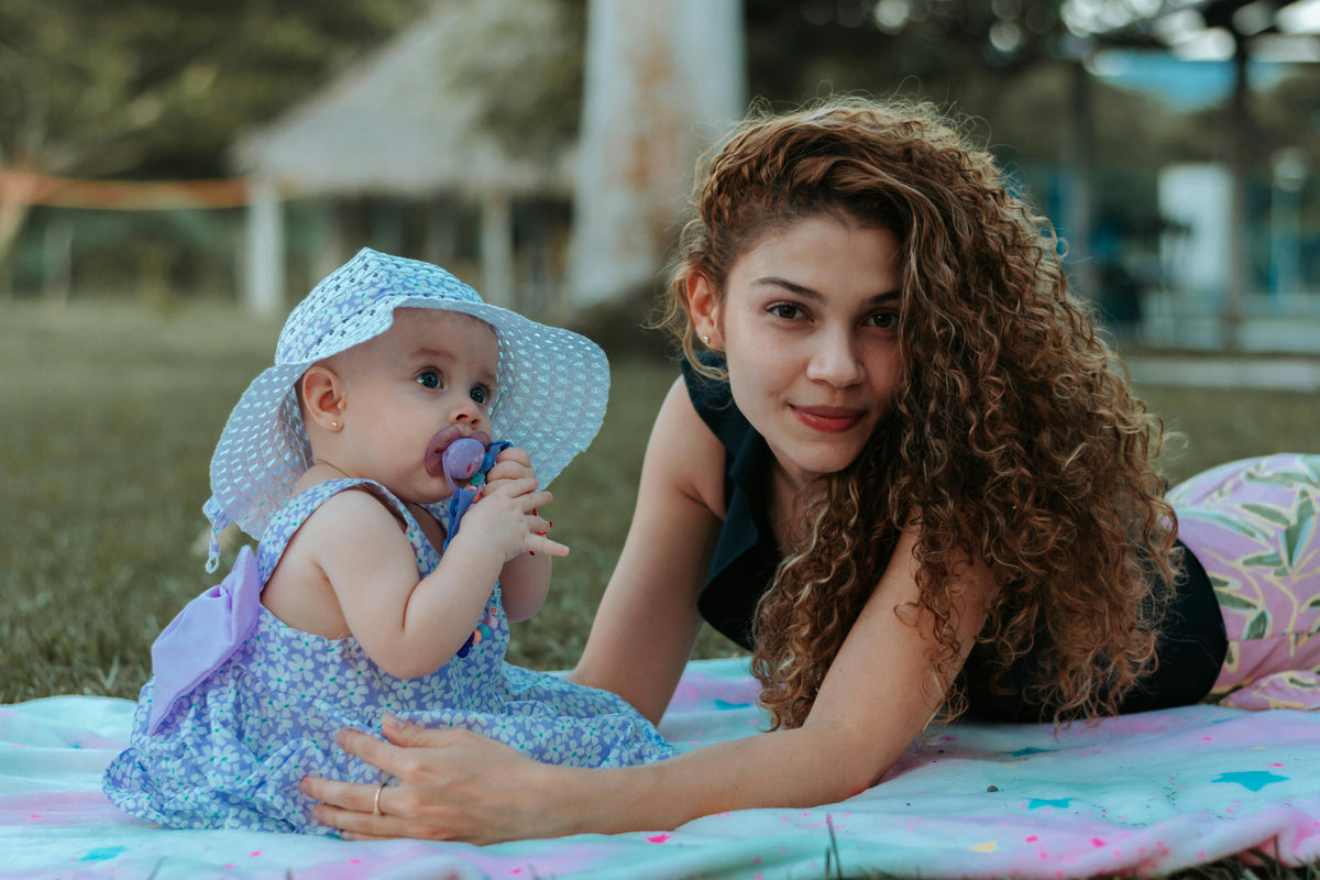 Curls & Cradles: Navigating Postpartum Hair Care for Curly-Haired Moms