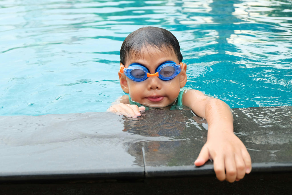 Why Children Who Swim Early May Face Hair Loss (and How to Protect Their Hair from Chlorine Damage)